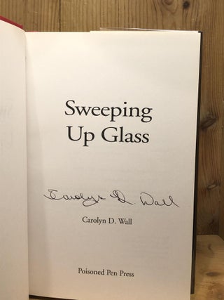 SWEEPING UP GLASS
