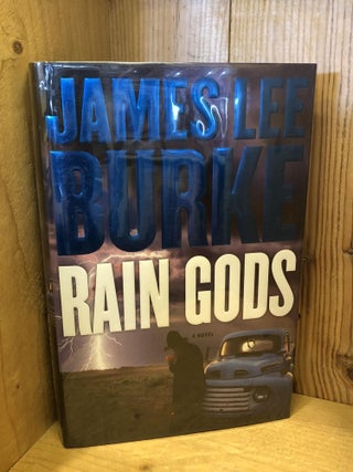 Item #007670 RAIN GODS. James Lee Burke