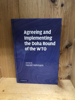 Item #008851 AGREEING AND IMPLEMENTING THE DOHA ROUND OF THE WTO. Harald Hohmann