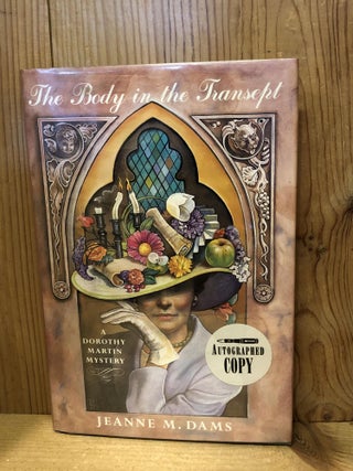 Item #503730 The Body in the Transept: A Dorothy Martin Mystery. Jeanne M. Dams