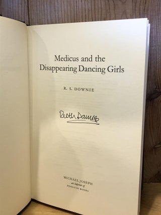 Medicus and the Disappearing Dancing Girls